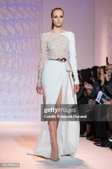 A model walks the runway during the Zuhair Murad show as part of ...