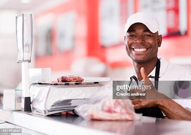 butcher with thumbs up - fresh deals stockfoto's en -beelden