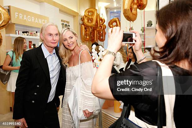 Dr. Fredric Brandt and Carmindy attend the opening of the Birchbox flagship store on July 10, 2014 in New York City.