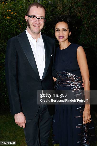 Fashion designer of Balenciaga Marco Zanin and Farida Khelfa Seydoux attend the 'Chambre Syndicale de la Haute Couture' Cocktail, to celebrate the...