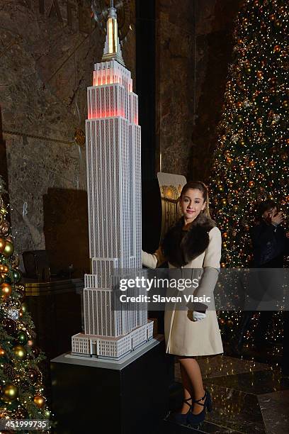 Actress/singer Ariana Grande visits The Empire State Building on November 25, 2013 in New York City.
