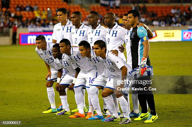 The Honduras national team against the Ecuador national team during an international friendly match at BBVA Compass Stadium on November 19, 2013 in...