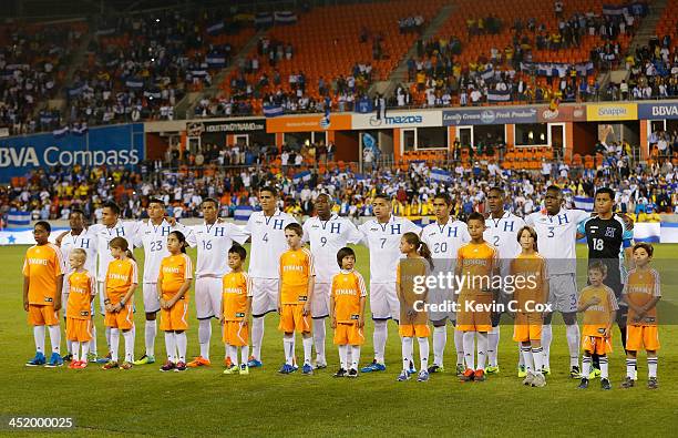 The Honduras national team against the Ecuador national team during an international friendly match at BBVA Compass Stadium on November 19, 2013 in...
