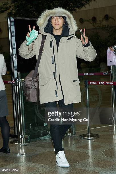 Lee Jung-Shin of South Korean boy band CNBLUE is seen upon arrival at the Gimpo International Airport on November 25, 2013 in Seoul, South Korea.