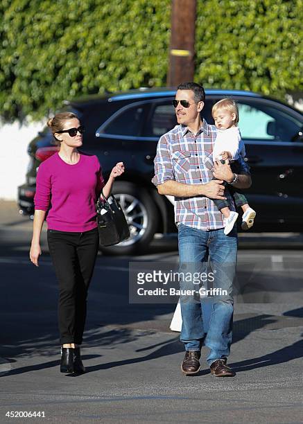 Reese Witherspoon and Jim Toth with son, Tennessee are seen on November 25, 2013 in Los Angeles, California.