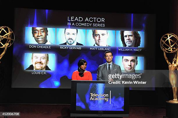 Actress Mindy Kaling and tv personality Carson Daly speak onstage at the 66th Primetime Emmy Awards Nominations at Leonard H. Goldenson Theatre on...