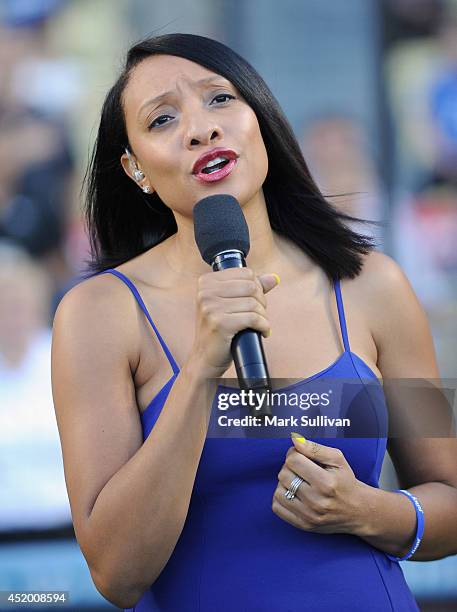 Singer Shelea Frazier sings the national anthem before the game between the San Diego Padres and Los Angeles Dodgers at Dodger Stadium on July 10,...