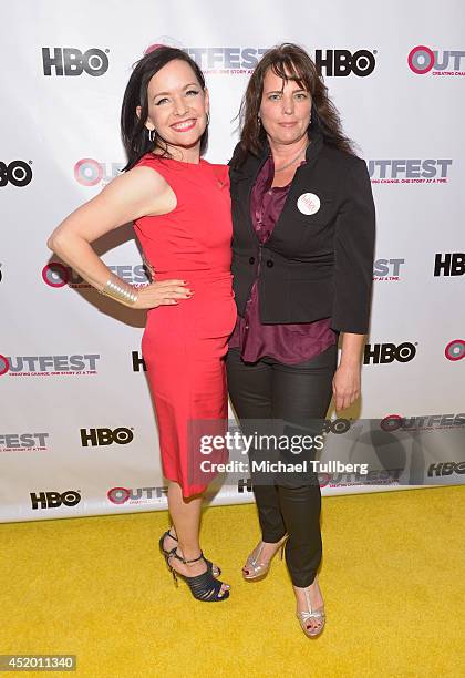 Actresses Guinevere Turner and Jane Clark attend the 2014 Outfest Opening Night Gala of "Life Partners" at Orpheum Theatre on July 10, 2014 in Los...