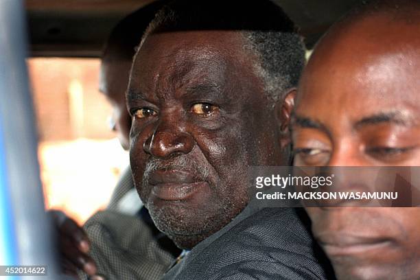Zambian opposition Patriotic Front leader Michael Sata is being led to Lusaka Central Prison by policemen after he appeared in court, 26 July 2005,...