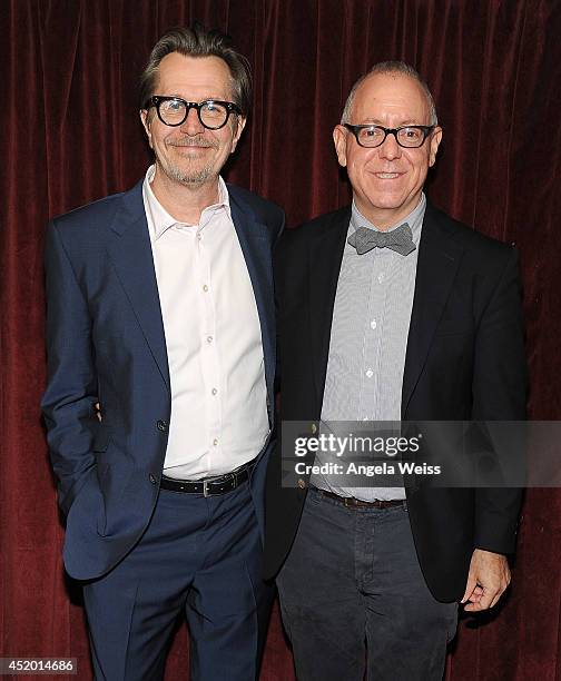 Actor Gary Oldman and producer James Schamus attend the 2014 Outfest opening night gala of "Life Partners" at Orpheum Theatre on July 10, 2014 in Los...