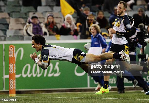 Matt Toomua of the Brumbies scores a try during the round 19 Super Rugby match between the Brumbies and the Force at Canberra Stadium on July 11,...