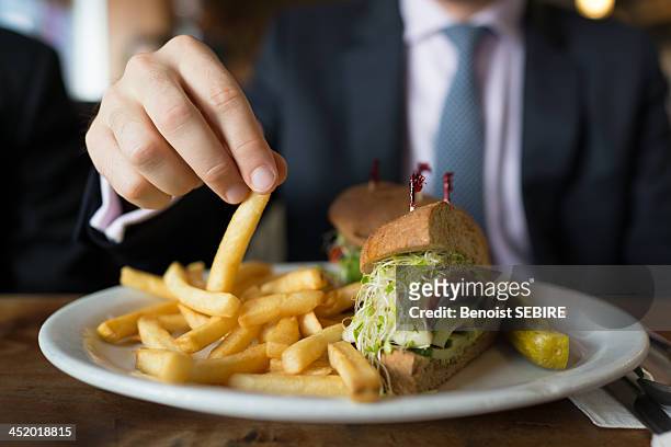 mmmm fries! - fast food french fries stock pictures, royalty-free photos & images