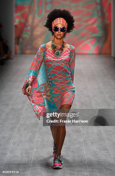 Model Rebecca Mir walks the runway at the Miranda Konstantinidou show during the Mercedes-Benz Fashion Week Spring/Summer 2015 at Erika Hess...