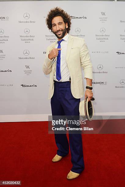 Massimo Sinato attends the Miranda Konstantinidou show during the Mercedes-Benz Fashion Week Spring/Summer 2015 at Erika Hess Eisstadion on July 11,...