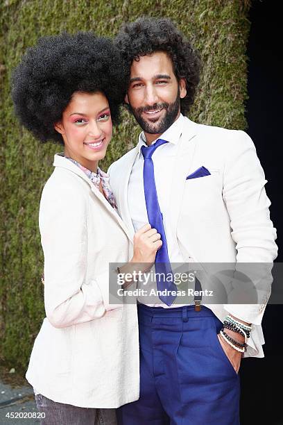 Rebecca Mir and Massimo Sinato arrive for the Miranda Konstantinidou show during the Mercedes-Benz Fashion Week Spring/Summer 2015 at Erika Hess...