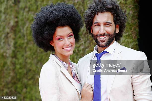 Rebecca Mir and Massimo Sinato arrive for the Miranda Konstantinidou show during the Mercedes-Benz Fashion Week Spring/Summer 2015 at Erika Hess...