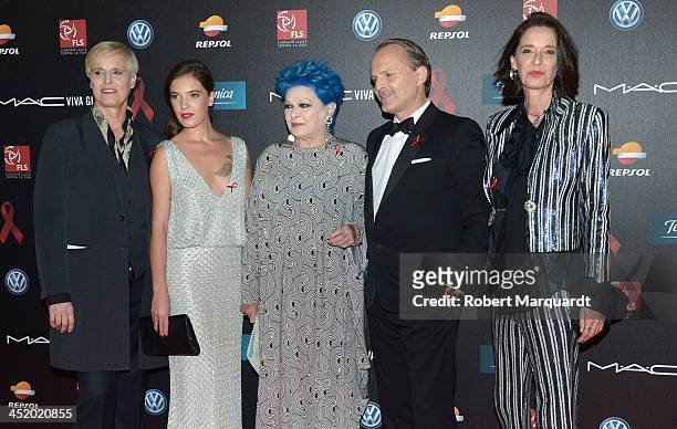 Lucia Dominguin, guest, Lucia Bose, Miguel Bose and Paola Dominguin pose during a photocall for the '4th Annual Gala Sida Barcelona 2013' held at the...