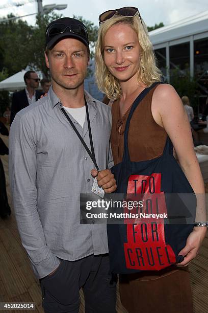 Hinnerk Schoenemann and Teresa Weissbach attend the Miranda Konstantinidou show during the Mercedes-Benz Fashion Week Spring/Summer 2015 at Erika...