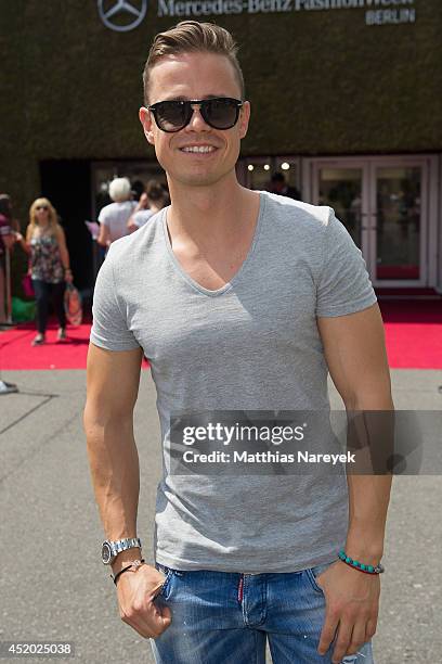 Pete Dwojak attends the Miranda Konstantinidou show during the Mercedes-Benz Fashion Week Spring/Summer 2015 at Erika Hess Eisstadion on July 11,...