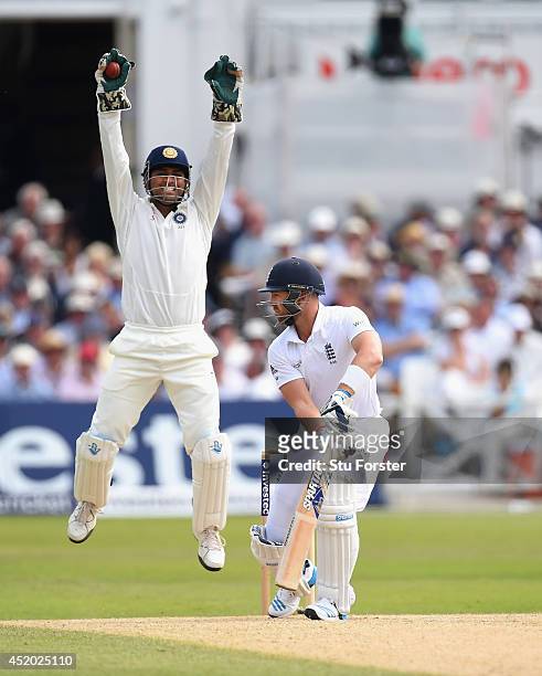 India captain Mahendra Singh Dhoni appeals with success for the wicket of England batsman Matt Prior off the bowling of Bhuvneshwar Kumar during day...