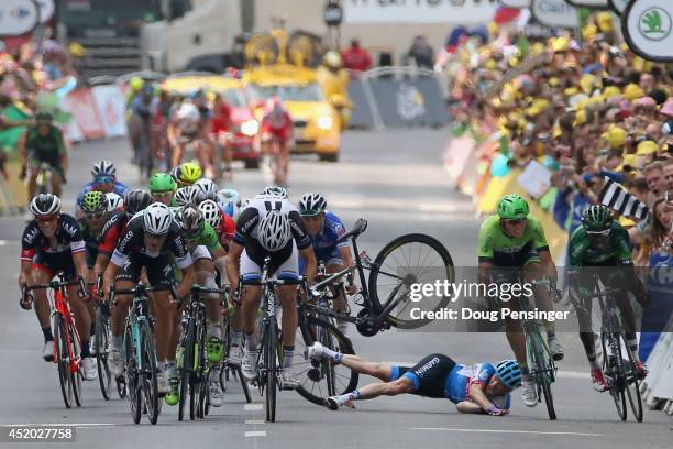 Andrew Talansky of the United States and Garmin-Sharp crashes in the sprint to the finish line in stage seven of the 2014 Le Tour de France from...