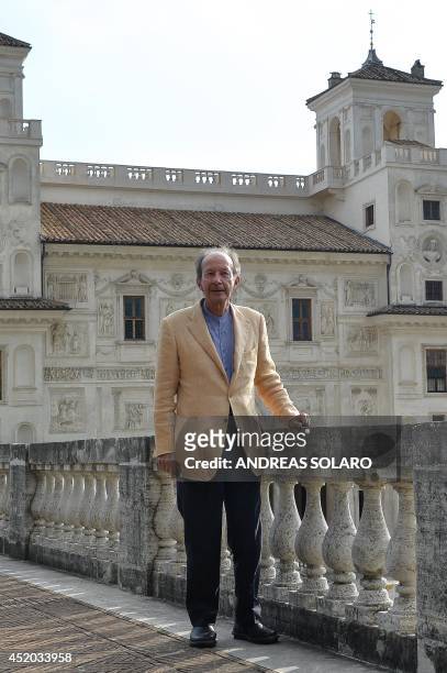 Italian philosopher Giorgio Agamben poses during a at the Villa Medici, on July 11, 2014 in Rome. AFP PHOTO / ANDREAS SOLARO