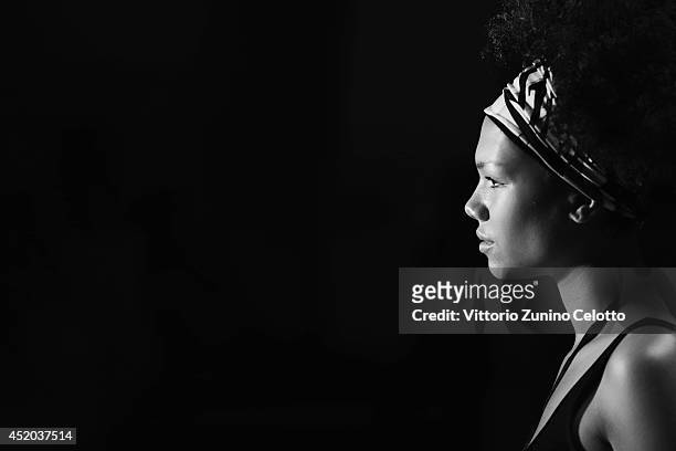 Model Dominique Miller is seen backstage ahead of the Miranda Konstantinidou show during the Mercedes-Benz Fashion Week Spring/Summer 2015 at Erika...
