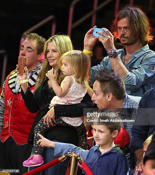 Actress Mira Sorvino and husband Christopher Backus with daughter Mattea Angel Backus attend the premiere of Ringling Bros. And Barnum & Bailey's...