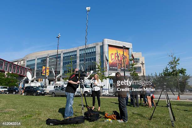 Members of the TV media broadcast film rom across the street of Quicken Loans arena which is next door to at Progressive Field where the Chicago...