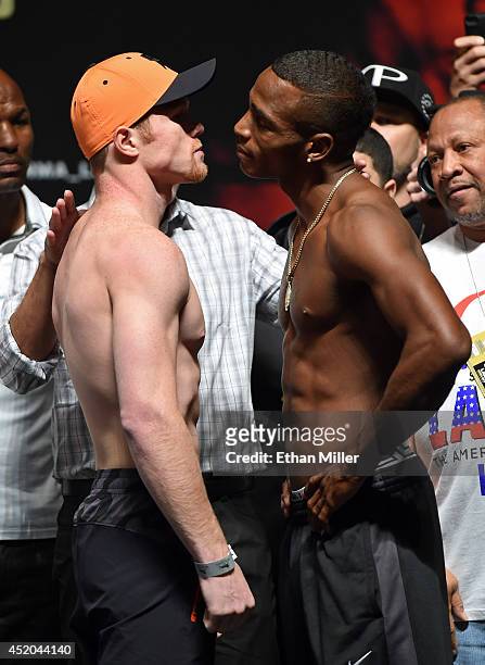 Boxers Canelo Alvarez and Erislandy Lara face off during their official weigh-in at the MGM Grand Garden Arena on July 11, 2014 in Las Vegas, Nevada....