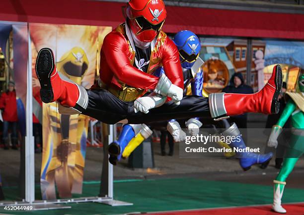 Power Rangers Super Megaforce rehearse for the 87th Annual Macy's Thanksgiving Day Parade at Macy's Herald Square on November 25, 2013 in New York...