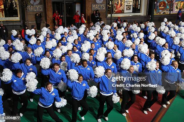 Varsity Spirit cheerleaders rehearse for the 87th Annual Macy's Thanksgiving Day Parade at Macy's Herald Square on November 25, 2013 in New York City.