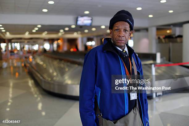 John Stewart Poses for a portrait in Terminal D at the Philadelphia International Airport where he works escorting people in wheel chairs. John...