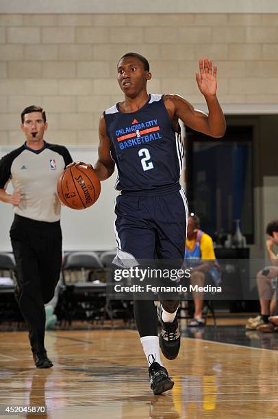 Nolan Smith of the Oklahoma City Thunder dribbles the ball against the Miami Heat during the game during the Samsung NBA Summer League 2014 on July...