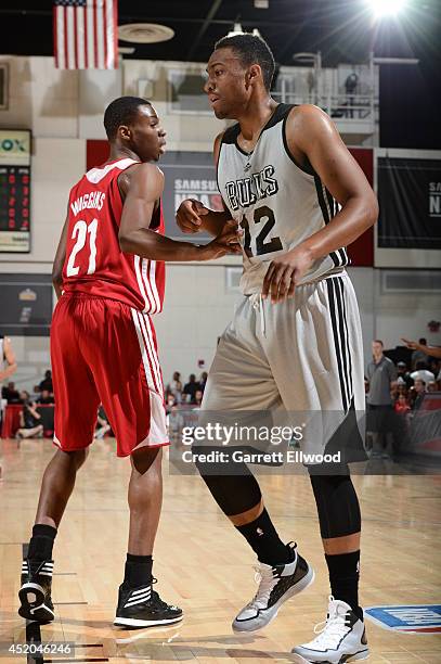 Andrew Wiggins of the Cleveland Cavaliers defends against Jabari Parker of the Milwaukee Bucks at the Samsung NBA Summer League 2014 on July 11, 2014...