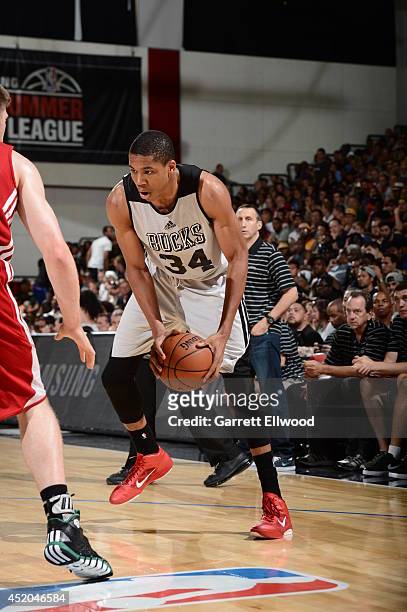 Giannis Antetokounmpo of the Milwaukee Bucks controls the ball against the Cleveland Cavaliers at the Samsung NBA Summer League 2014 on July 11, 2014...