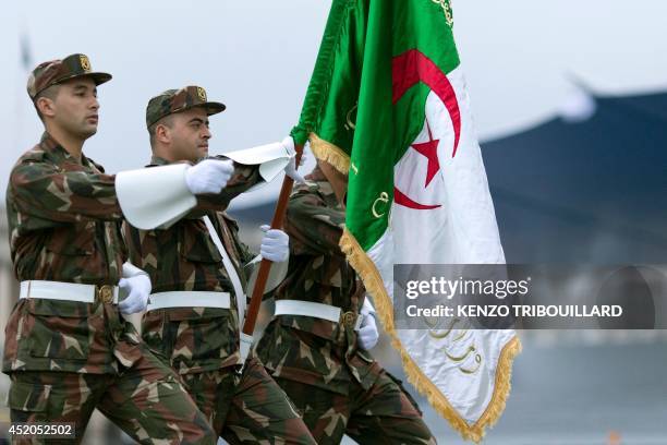 Algerian soldiers parade on July 12, 2014 on the Champs Elysees avenue in Paris, during a rehearsal of the French national celebration, the Bastille...