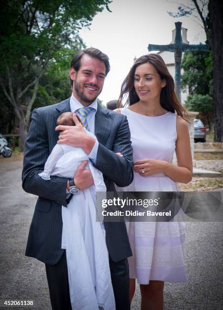 Prince Felix of Luxembourg and Princess Claire of Luxembourg pose with their daughter Princess Amalia of Luxembourg after her Christening ceremony,...