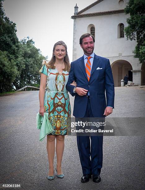 Hereditary Grand Duke Guillaume and Hereditary Grand Duchess Stephanie of Luxembourg pose after the baptism ceremony of Princess Amalia at the Saint...