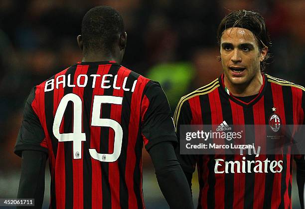 Alessandro Matri and Mario Balotelli of AC Milan during the Serie A match between AC Milan and Genoa CFC at Stadio Giuseppe Meazza on November 23,...