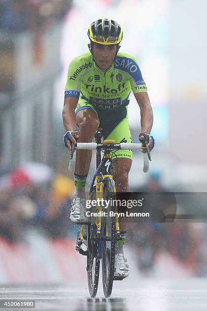 Alberto Contador of Spain and Tinkoff-Saxo puts in a late attack to the finish line to gain seconds on the general classification during the eighth...