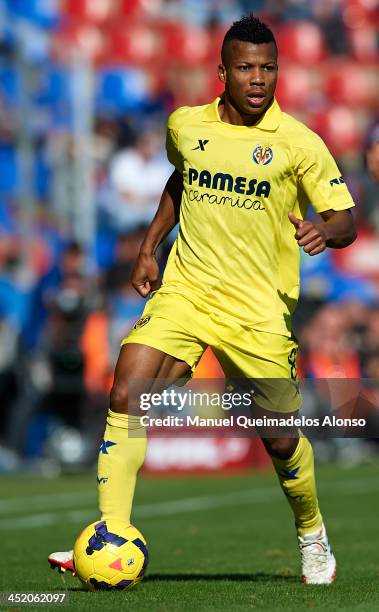 Ikechukwu Uche of Villarreal runs with the ball during the La Liga match between Levante UD and Villarreal CF at Ciutat de Valencia on November 24,...