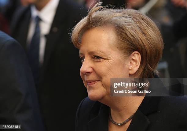 German Chancellor and Chairwoman of the German Christian Democrats Angela Merkel arrives at the party headquaters of the German Social Democrats for...