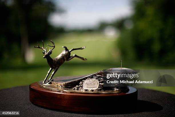 The John Deere Classic trophy is displayed on the first tee during the third round of the John Deere Classic held at TPC Deere Run on July 12, 2014...