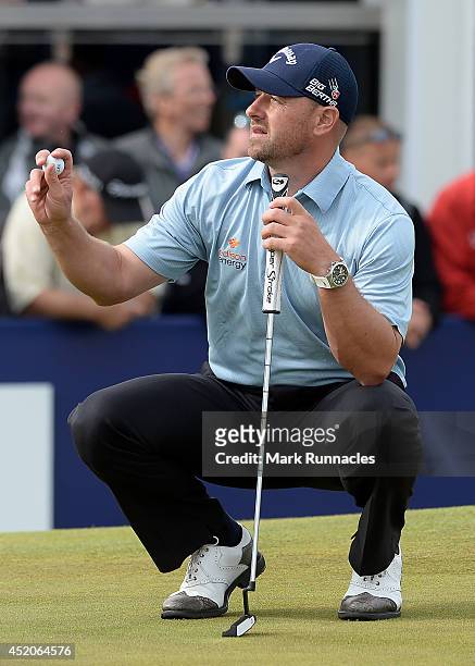 Craig Lee of Scotland in action on the 18th green during the Aberdeen Asset Management Scottish Open third round at Royal Aberdeen Golf Club on July...