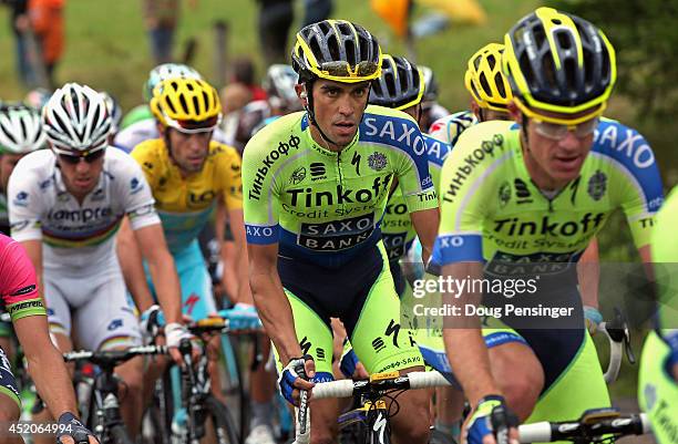 Alberto Contador of Spain and Tinkoff-Saxo rides ahead of Vincenzo Nibali of Italy and the Astana Pro Team in the overall race leader's yellow jersey...