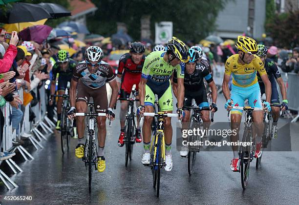 Alberto Contador of Spain and Tinkoff-Saxo attacks the group of the yellow jersey of Vincenzo Nibali of Italy and the Astana Pro Team on the final...