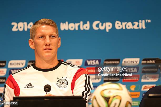 Bastian Schweinsteiger of Germany attends a press conference prior to the final match of the 2014 World Cup between Germany and Argentina at The...