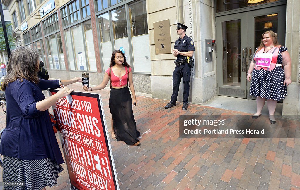 Anti abortion protestors stayed across Congress st. from the Planned Parenthood entrance