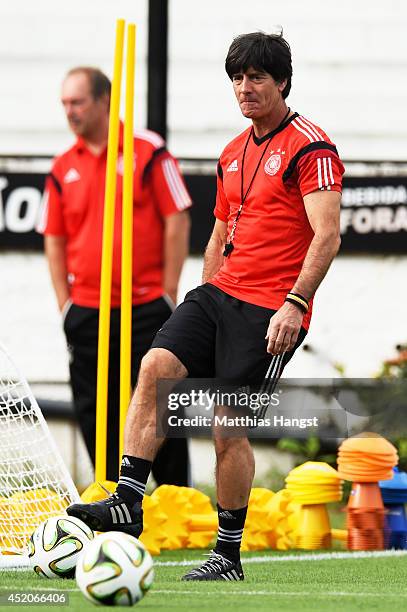Head coach Joachim Loew of Germany looks on during the Germany training session, ahead of the 2014 FIFA World Cup Final, at Estadio Sao Januario on...